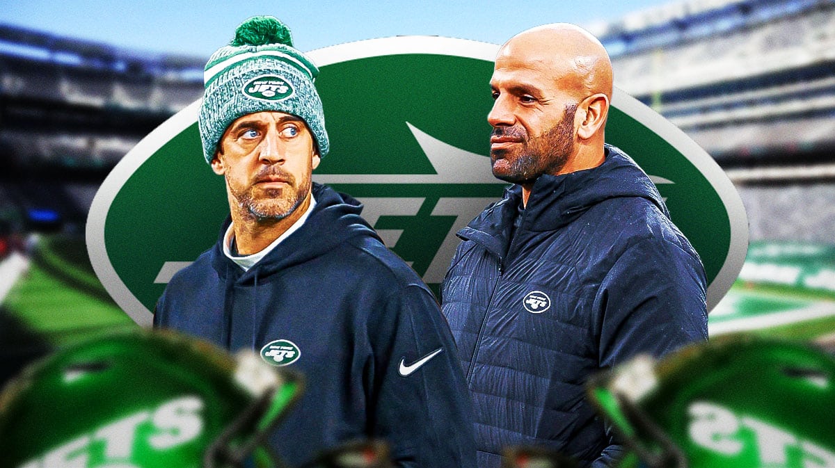 Aaron Rodgers and Robert Saleh in front of a Jets logo