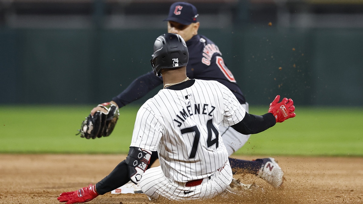 May 9, 2024; Chicago, Illinois, USA; Chicago White Sox designated hitter Eloy Jimenez (74) steals the second base against Cleveland Guardians second baseman Andres Gimenez (0) during the third inning at Guaranteed Rate Field. Mandatory Credit: Kamil Krzaczynski-USA TODAY Sports