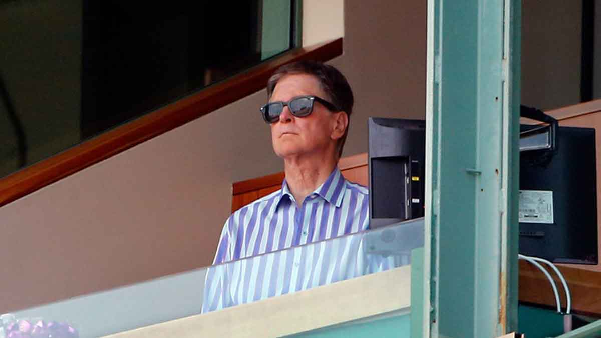 Boston Red Sox owner John Henry watches the game between the Boston Red Sox and the Houston Astros during the fourth inning at Fenway Park