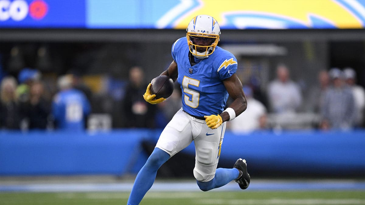 Chargers wide receiver Joshua Palmer (5) runs with the ball during the second half against the Kansas City Chiefs at SoFi Stadium. 