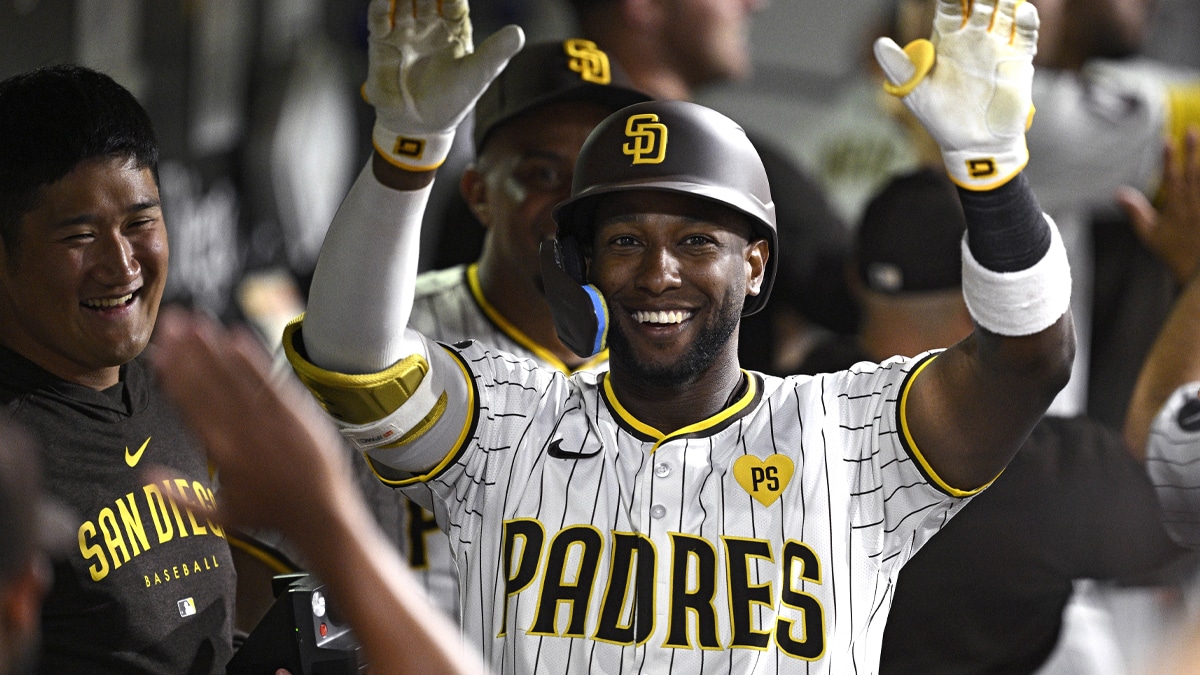  San Diego Padres left fielder Jurickson Profar (10) is congratulated in the dugout after hitting a grand slam home run against the Washington Nationals during the sixth inning at Petco Park. 