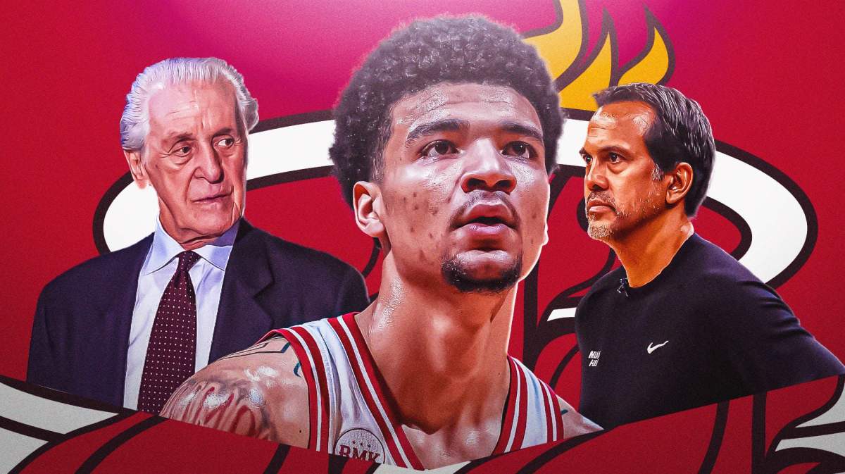 Miami Heat star Kel'el Ware next to Pat Riley and Erik Spoelstra in front of the Heat logo.