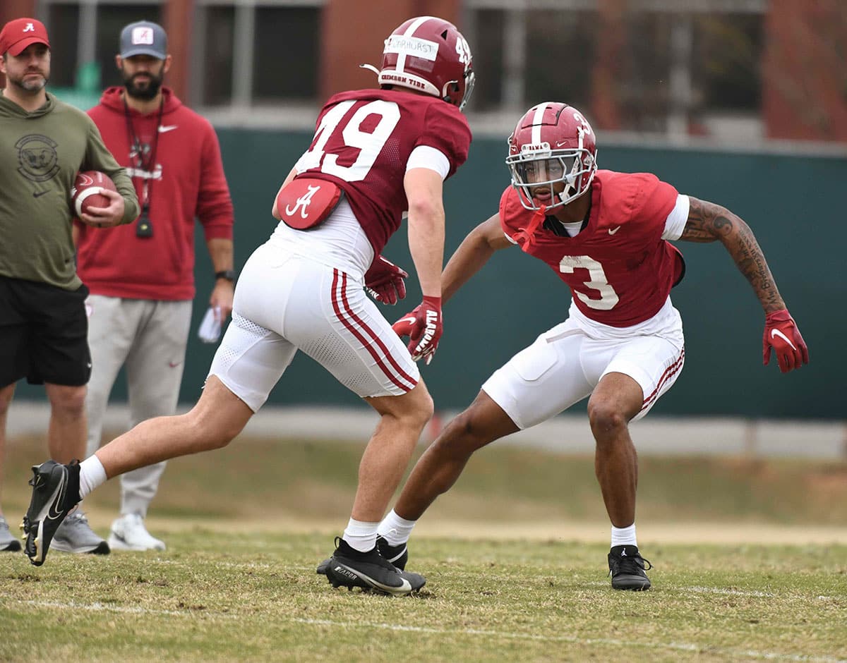 Defensive backs Conner Warhurst (49) and Keon Sabb (3) work during practice at the University Alabama Thursday.