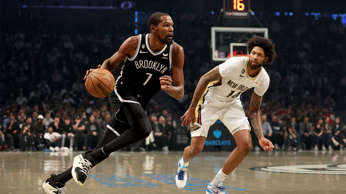 Brooklyn Nets forward Kevin Durant (7) drives to the basket against New Orleans Pelicans forward Brandon Ingram (14) during the first quarter at Barclays Center.