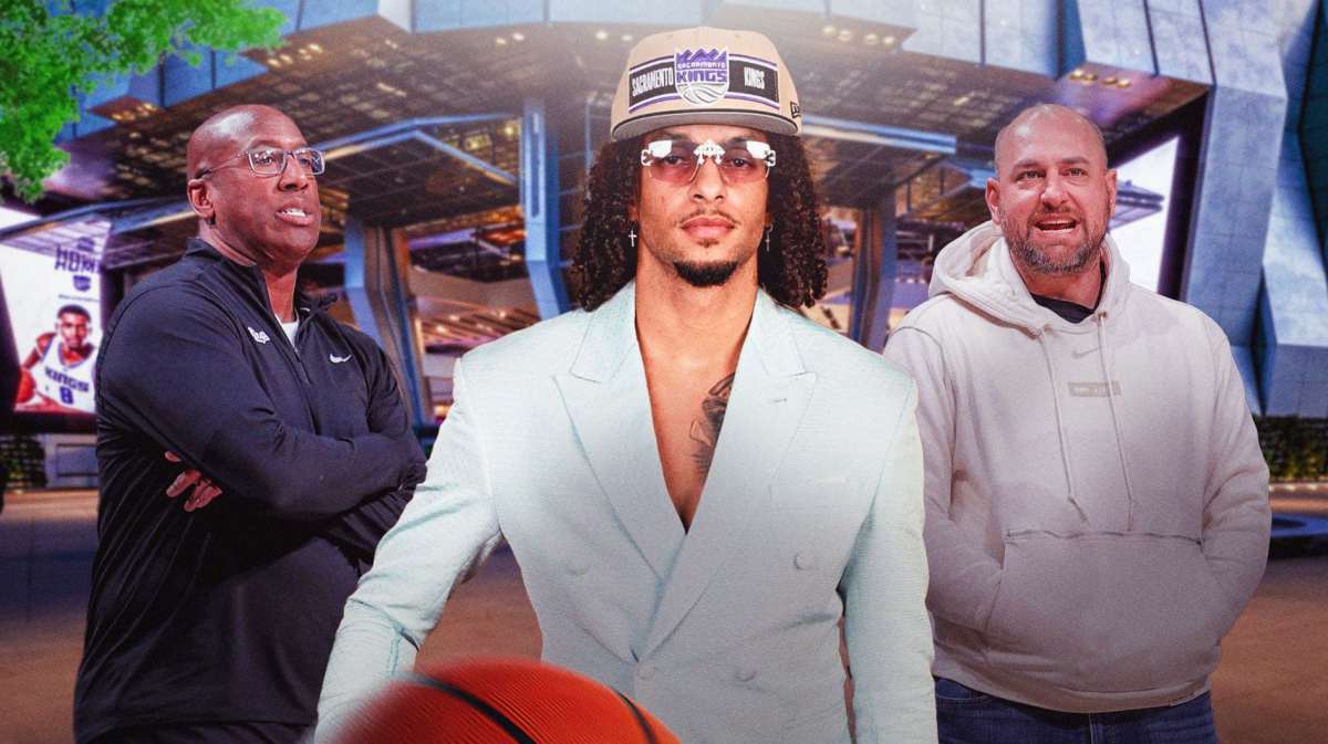 Devin Carter in the middle, Sacramento Kings wallpaper in the background