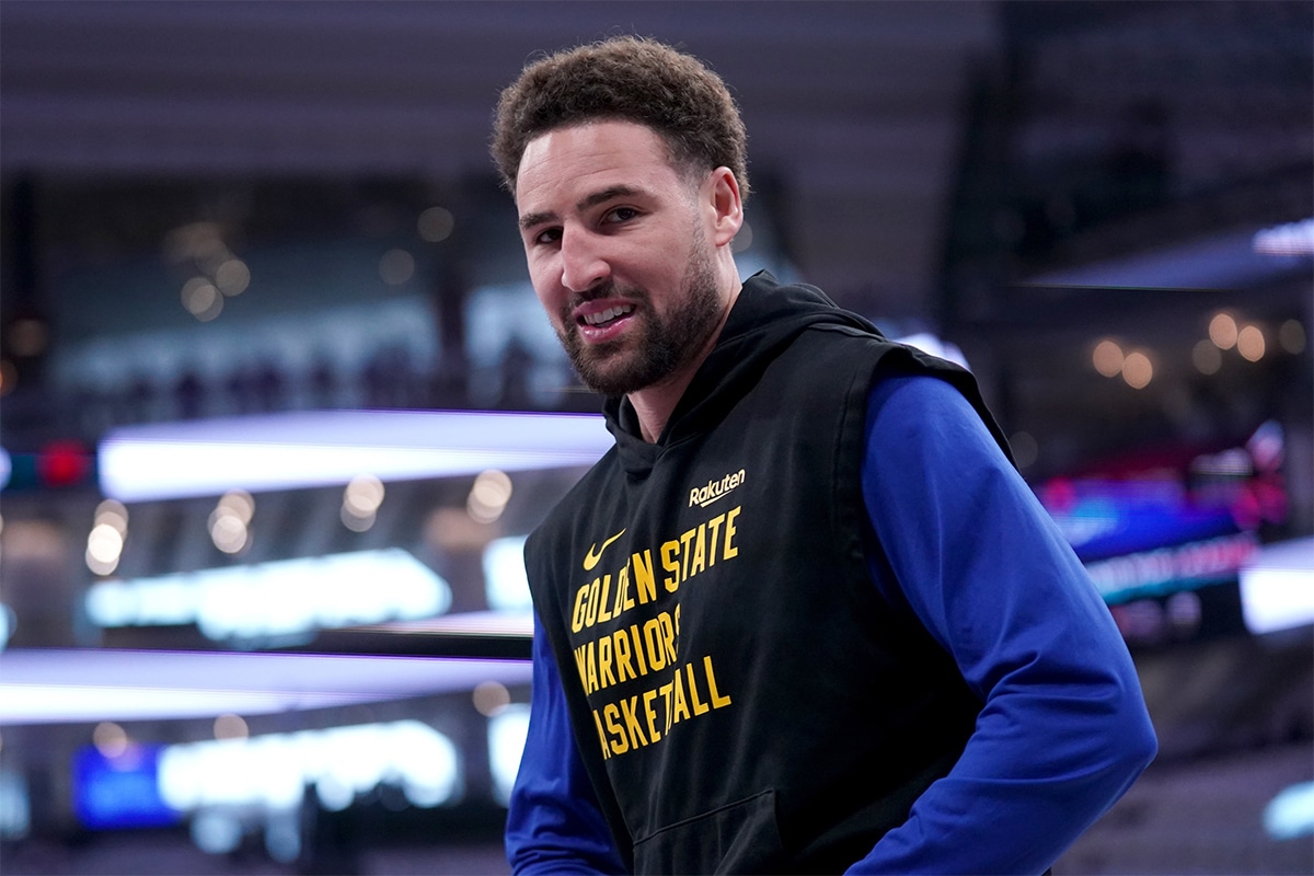 Golden State Warriors guard Klay Thompson (11) warms up before a play-in game against the Sacramento Kings in the 2024 NBA playoffs at the Golden 1 Center.
