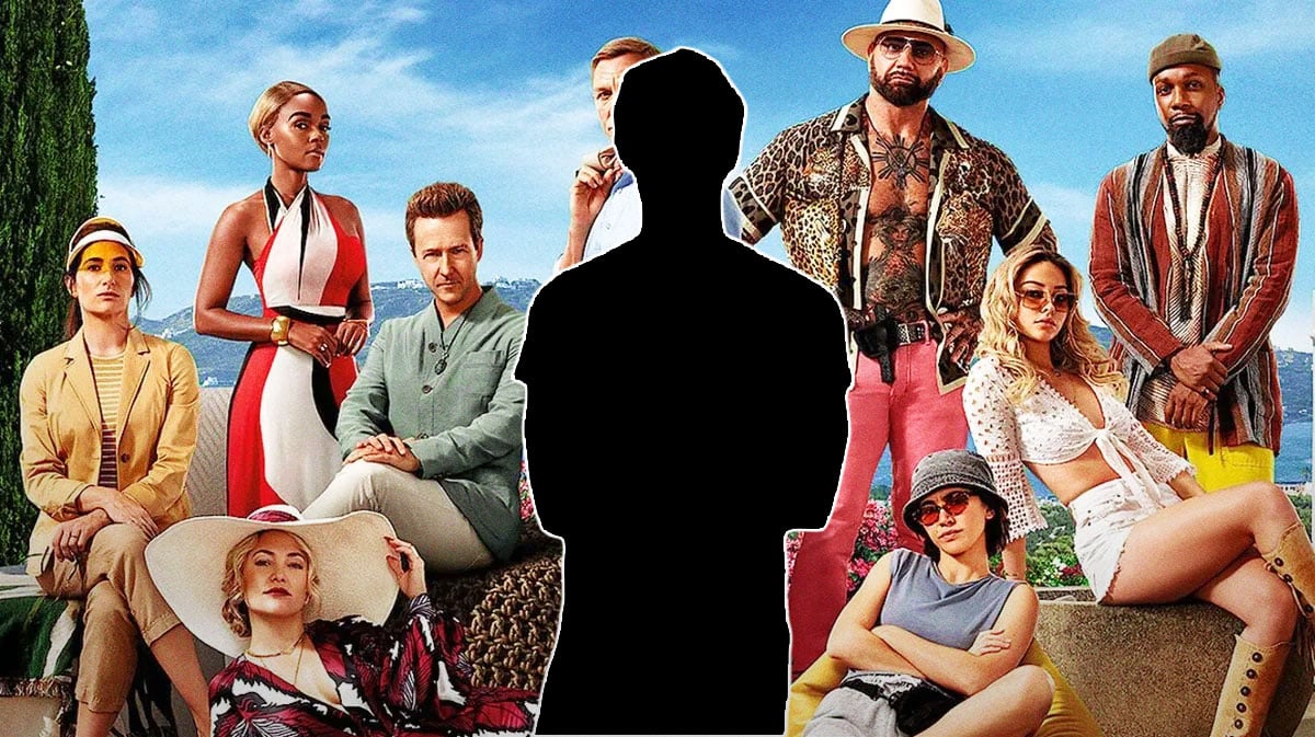 Knives Out cast with mysterious figure.