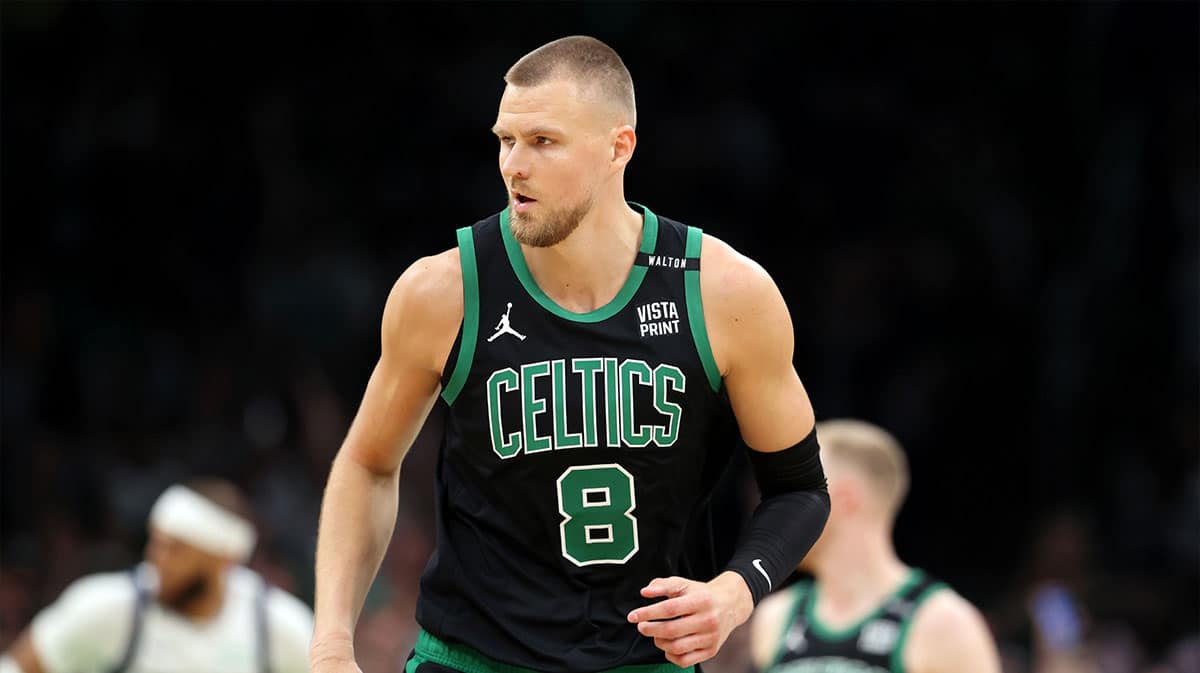  Boston Celtics center Kristaps Porzingis (8) reacts after a play against the Dallas Mavericks during the first quarter in game two of the 2024 NBA Finals at TD Garden.