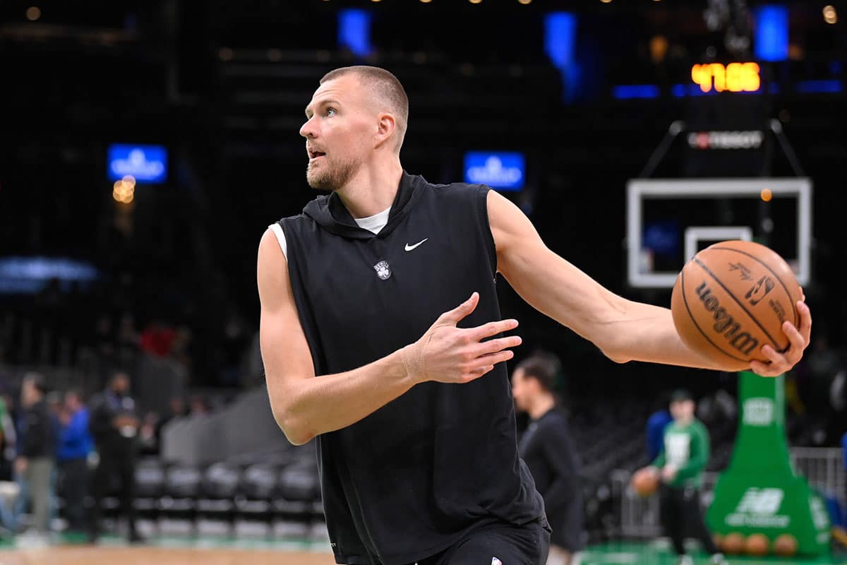 Boston Celtics center Kristaps Porzingis (8) warms up before a game against the Sacramento Kings at TD Garden.