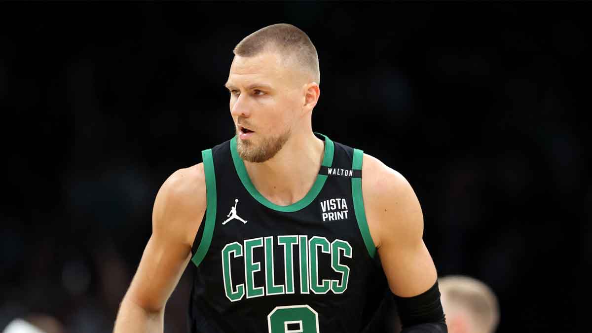 Boston Celtics center Kristaps Porzingis (8) reacts after a play against the Dallas Mavericks during the first quarter in game two of the 2024 NBA Finals at TD Garden.