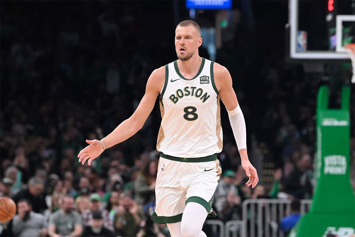 Boston Celtics center Kristaps Porzingis (8) runs up the court against the Portland Trail Blazers during the first half at TD Garden.