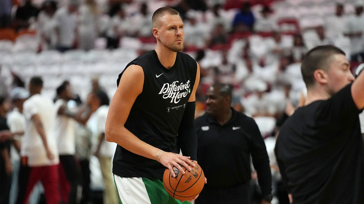 Boston Celtics center Kristaps Porzingis (8) warms-up before game three of the first round for the 2024 NBA playoffs against the Miami Heat at Kaseya Center