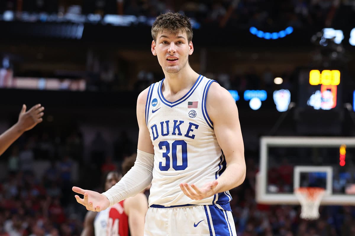 Duke Blue Devils center Kyle Filipowski (30) reacts in the second half against the North Carolina State Wolfpack in the finals of the South Regional of the 2024 NCAA Tournament at American Airline Center.