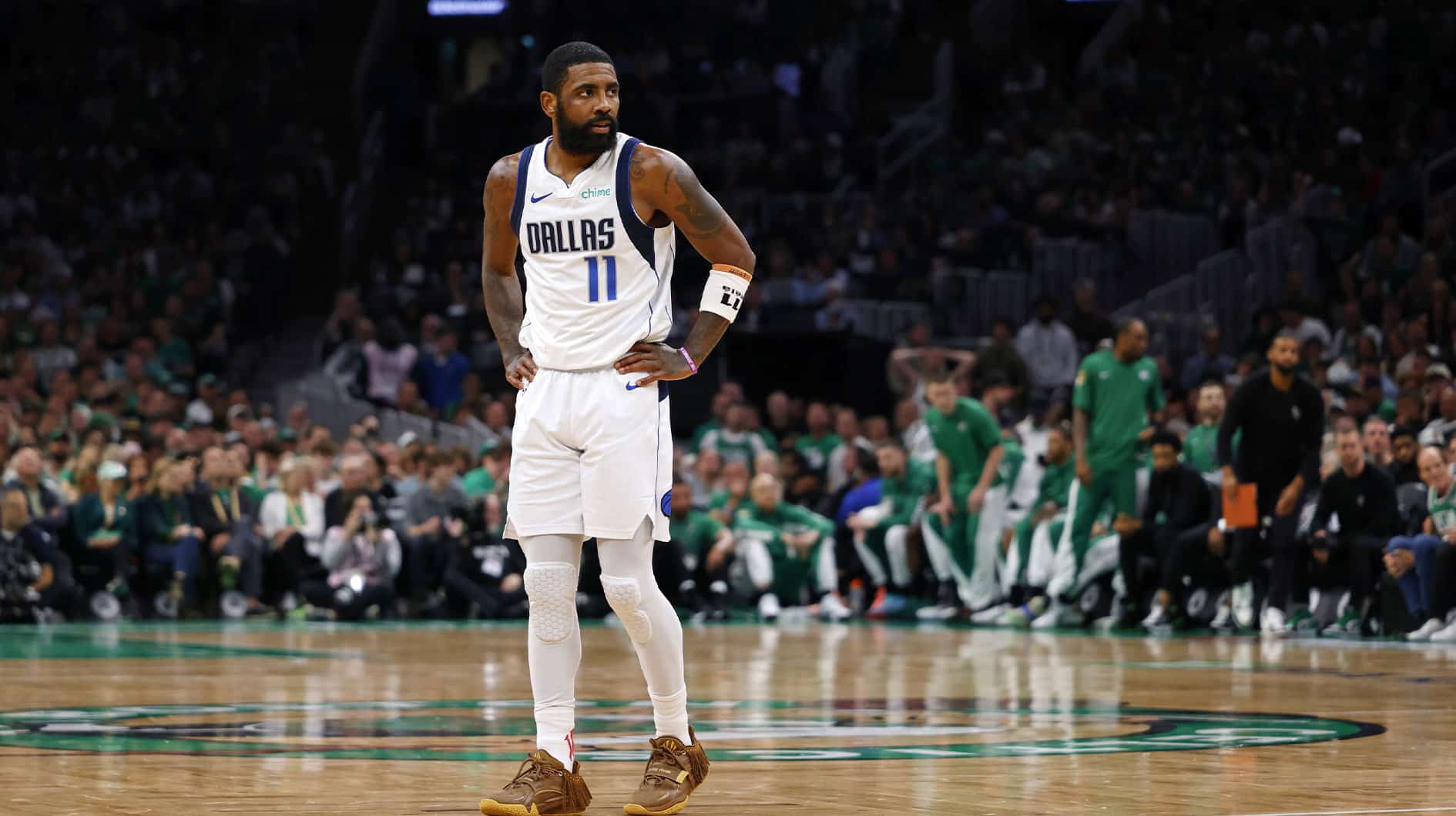 Dallas Mavericks guard Kyrie Irving (11) reacts after a play against the Boston Celtics during the first quarter in game two of the 2024 NBA Finals at TD Garden. 
