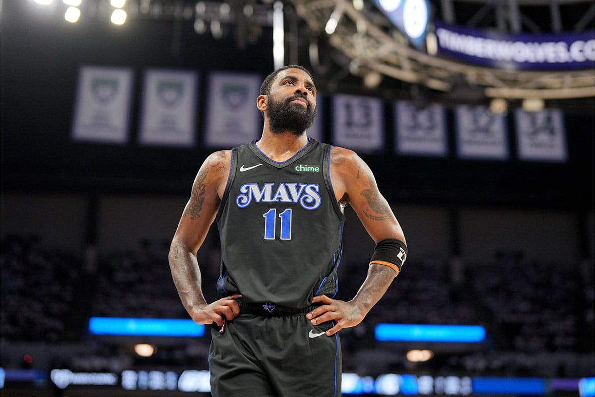 Dallas Mavericks guard Kyrie Irving (11) looks on in the third quarter against the Minnesota Timberwolves during game two of the western conference finals for the 2024 NBA playoffs at Target Center.