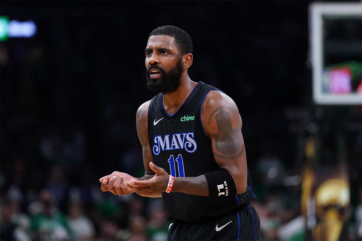  Dallas Mavericks guard Kyrie Irving (11) reacts in the third quarter against the Boston Celtics during game one of the 2024 NBA Finals at TD Garden.