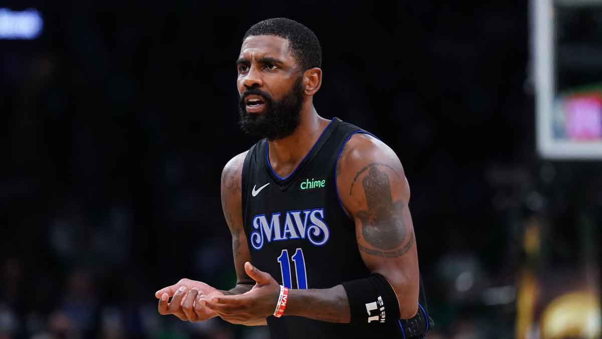 Dallas Mavericks guard Kyrie Irving (11) reacts in the third quarter against the Boston Celtics during game one of the 2024 NBA Finals at TD Garden.
