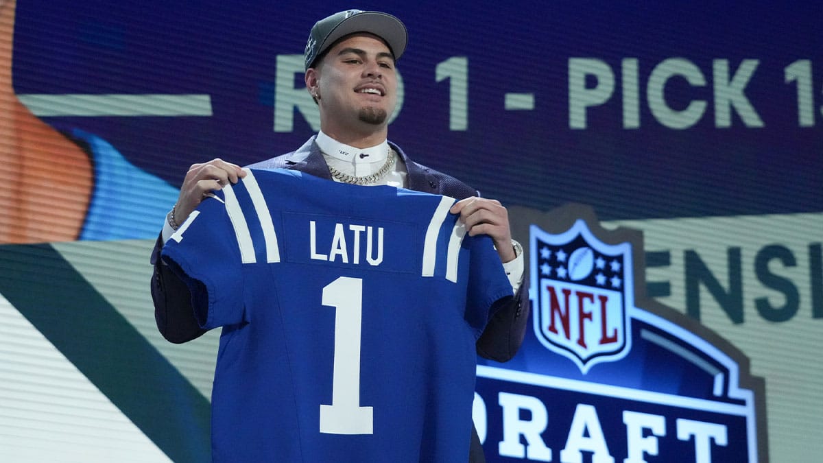UCLA Bruins defensive lineman Laiatu Latu poses after being selected by the Indianapolis Colts as the No. 15 pick in the first round of the 2024 NFL Draft at Campus Martius Park and Hart Plaza.
