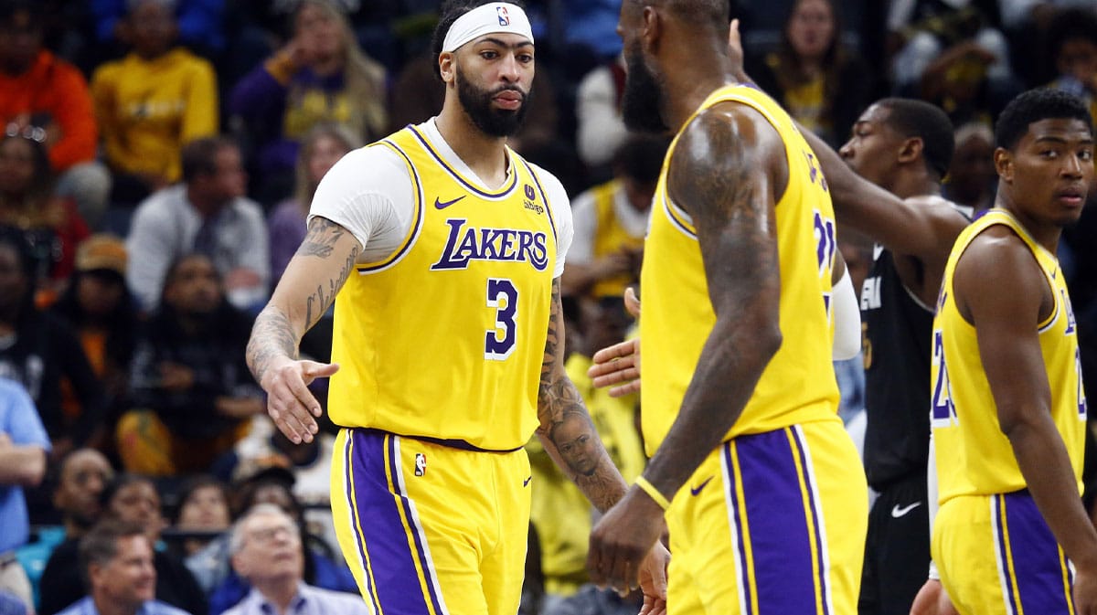 Los Angeles Lakers forward Anthony Davis (3) reacts with forward LeBron James (23) during the second half against the Memphis Grizzlies at FedExForum. 