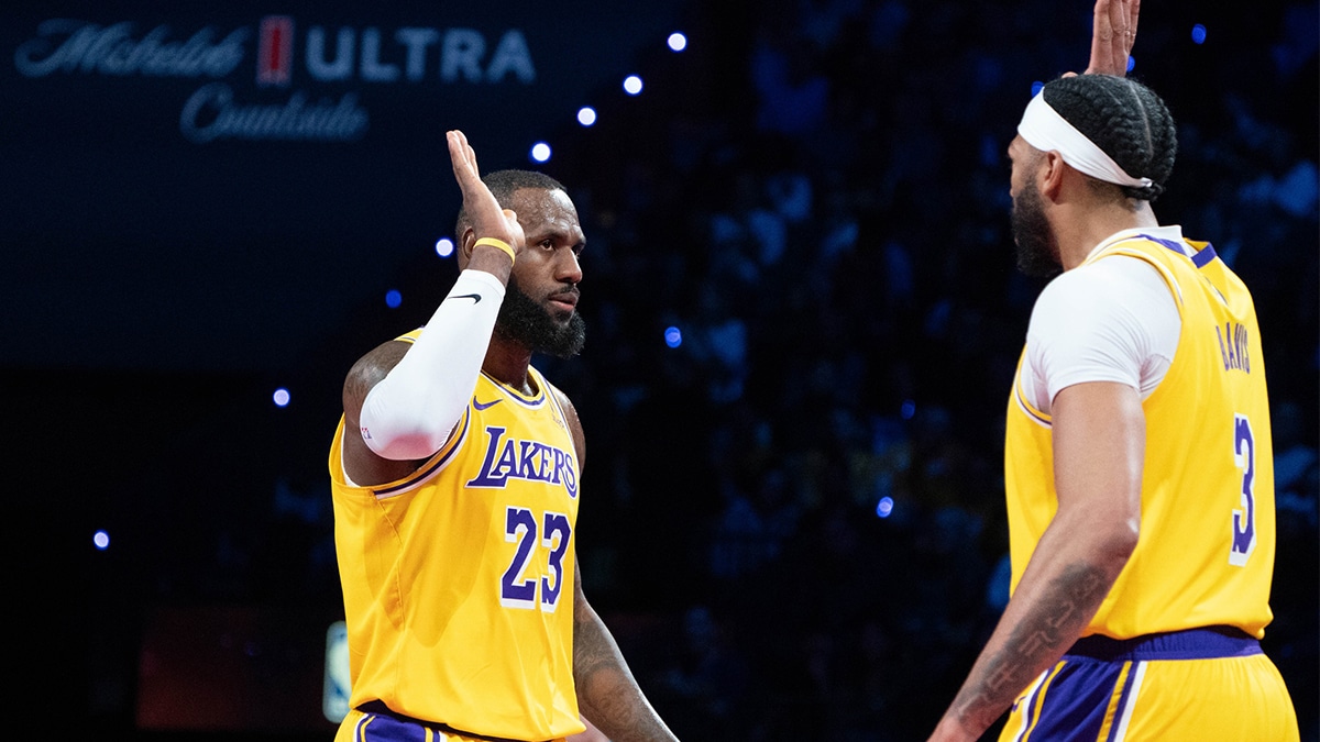 Los Angeles Lakers forward LeBron James (23) high-fives forward Anthony Davis (3)