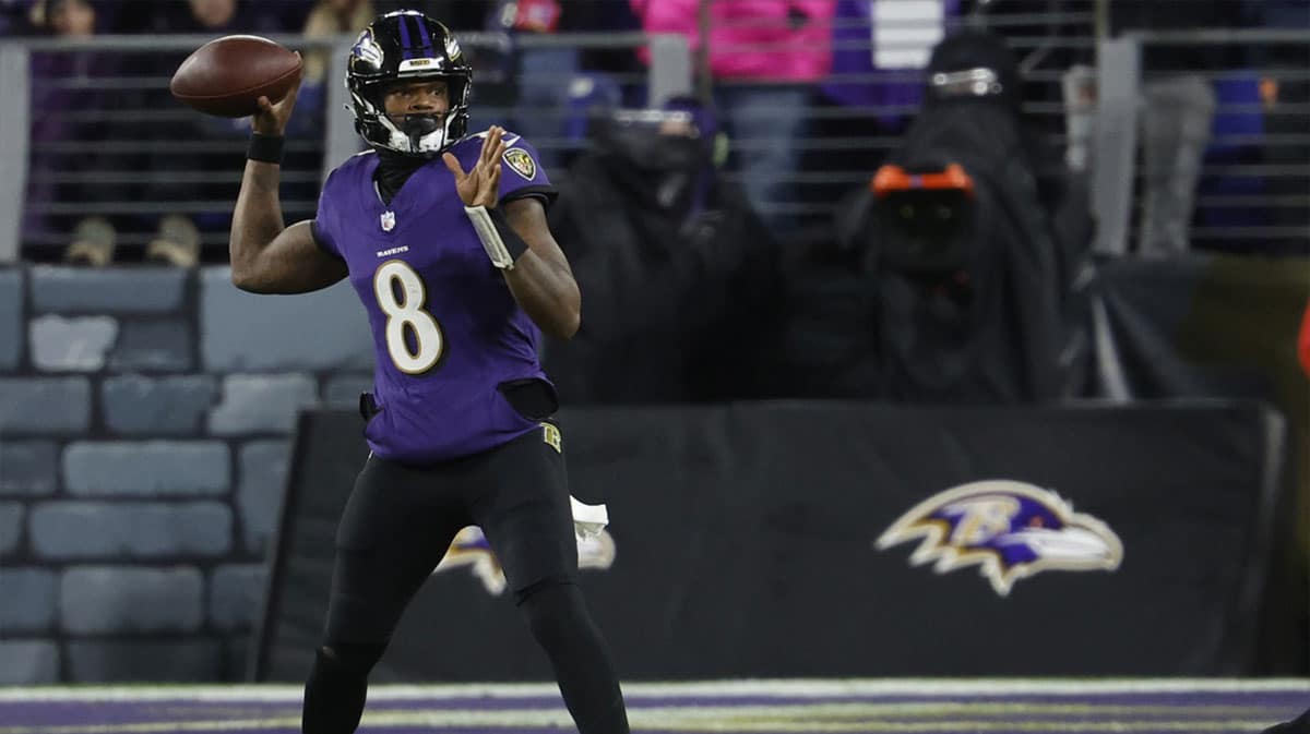 Baltimore Ravens quarterback Lamar Jackson (8) passes the ball against the Kansas City Chiefs in the AFC Championship football game at M&T Bank Stadium.