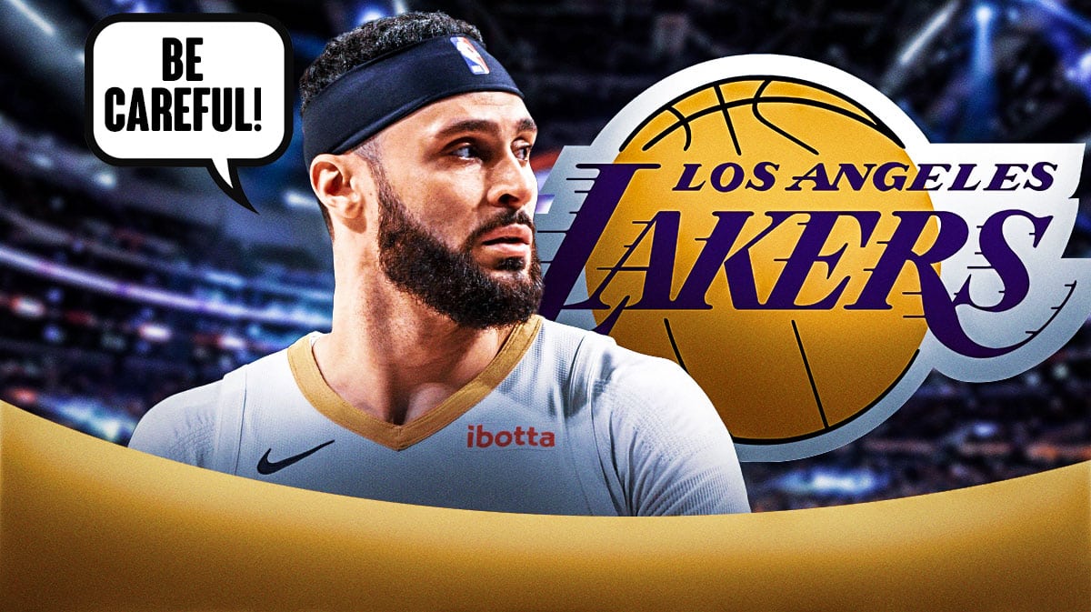 Larry Nance Jr. tells the Lakers logo "be careful!"