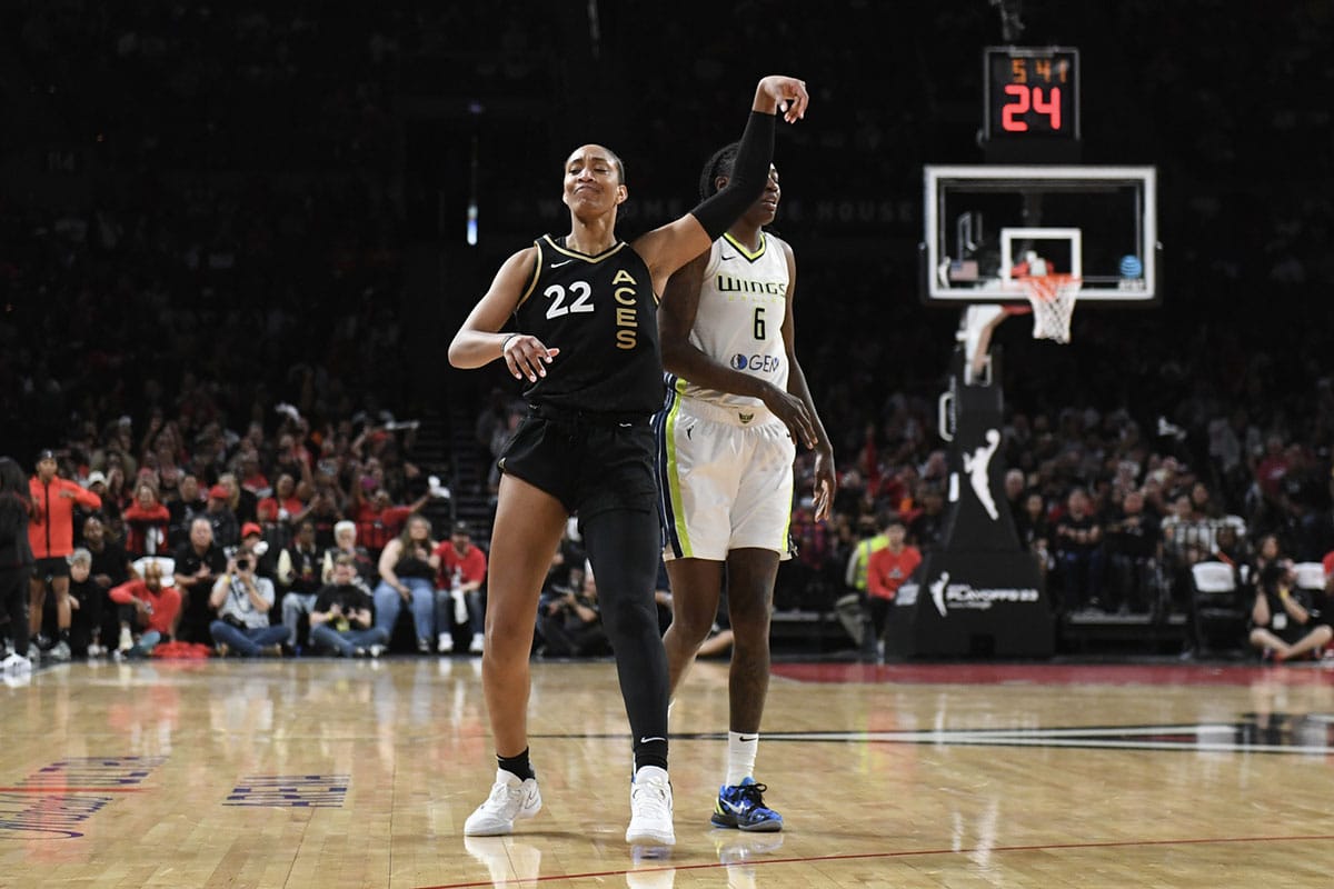 Las Vegas Aces forward A'ja Wilson (22) celebrates scoring by Dallas Wings forward Natasha Howard (6) in the second half during game two of the 2023 WNBA Playoffs at Michelob Ultra Arena. 