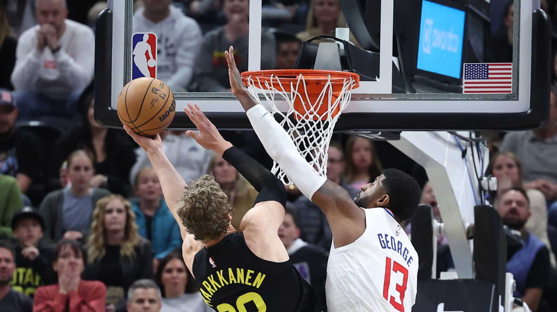 Utah Jazz forward Lauri Markkanen (23) goes to the basket against Los Angeles Clippers forward Paul George (13) in the fourth quarter at Delta Center. 