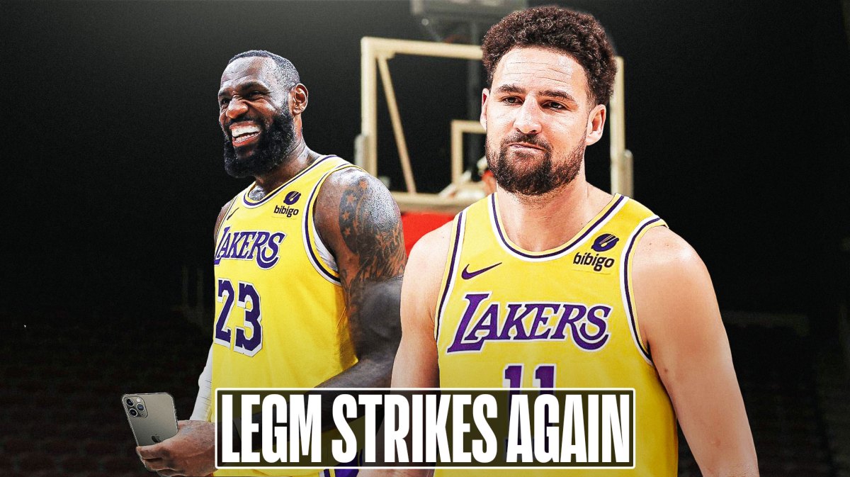 LeBron James holding a phone while smiling, with Klay Thompson in a Lakers uniform beside him, caption below: "LeGM STRIKES AGAIN"