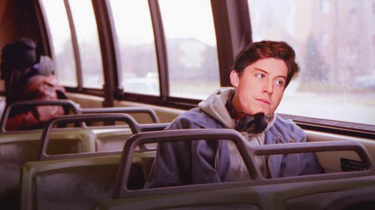 Mitch Marner (Maple Leafs) on a bus and staring outside