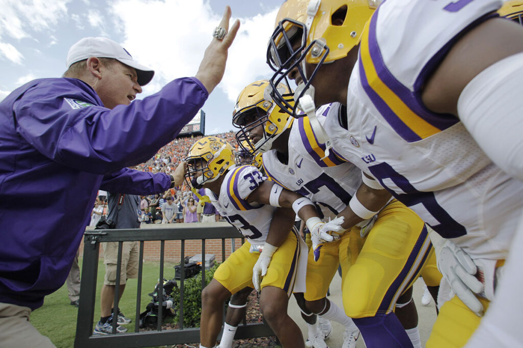 LSU head coach Les Miles gets his team ready to take the field at Jordan Hare Stadium against the Auburn Tigers. 