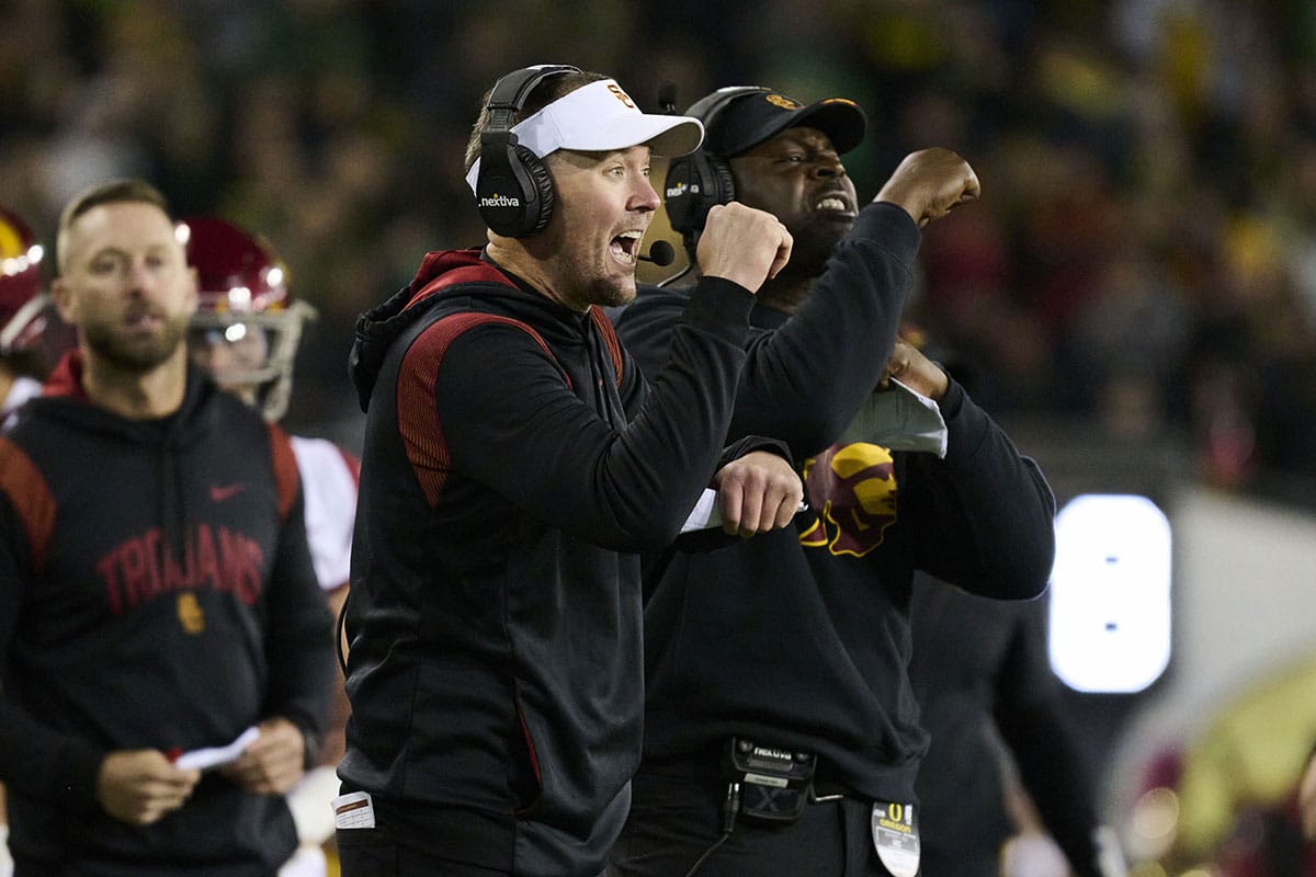 USC Trojans head coach Lincoln Riley signals to the offense during the second half against the Oregon Ducks at Autzen Stadium.