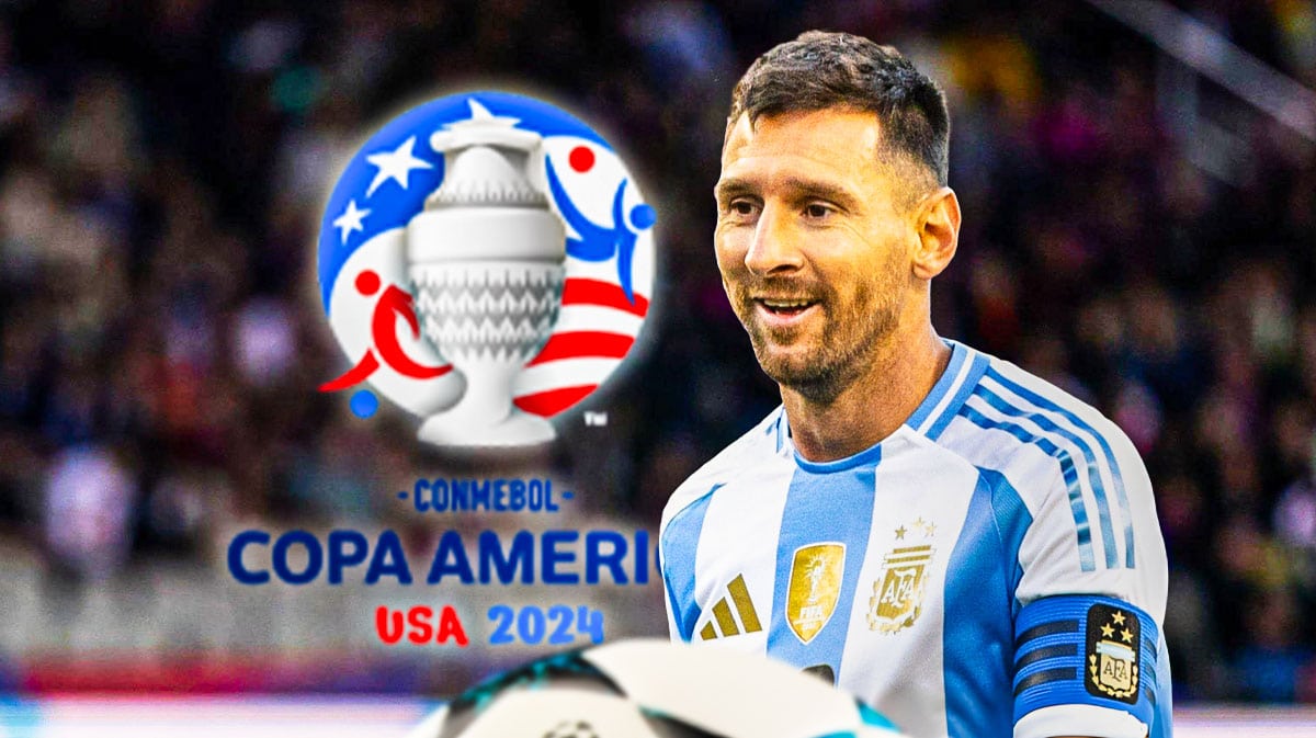 Lionel Messi smiling in front of the Copa America logo