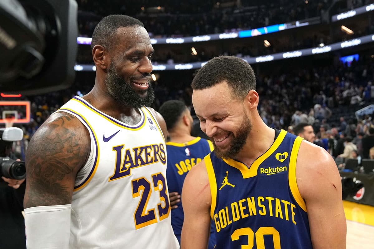 Jan 27, 2024; San Francisco, California, USA; Los Angeles Lakers forward LeBron James (23) and Golden State Warriors guard Stephen Curry (right) talk after the game at Chase Center. Mandatory Credit: Darren Yamashita-USA TODAY