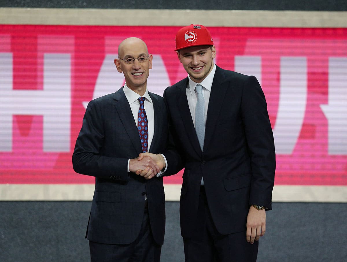 Luka Doncic Hawks hat on draft day