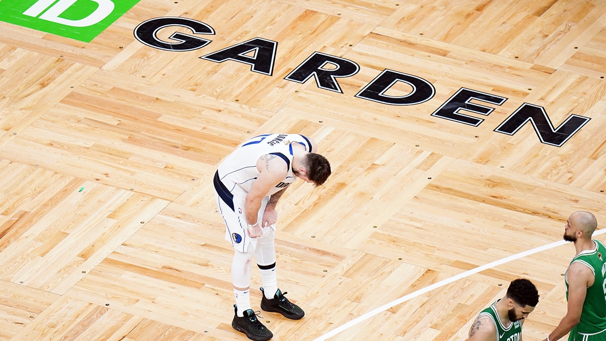 Dallas Mavericks guard Luka Doncic (77) reacts in the fourth quarter against the Boston Celtics during game five of the 2024 NBA Finals at TD Garden.