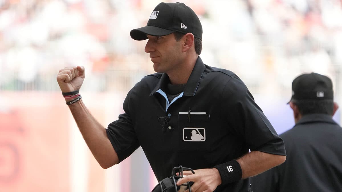 Home plate umpire Pat Hoberg (31) calls an out in the fifth inning during a MLB World Tour game between the San Diego Padres and the San Francisco Giants at Estadio Alfredo Harp Helu.