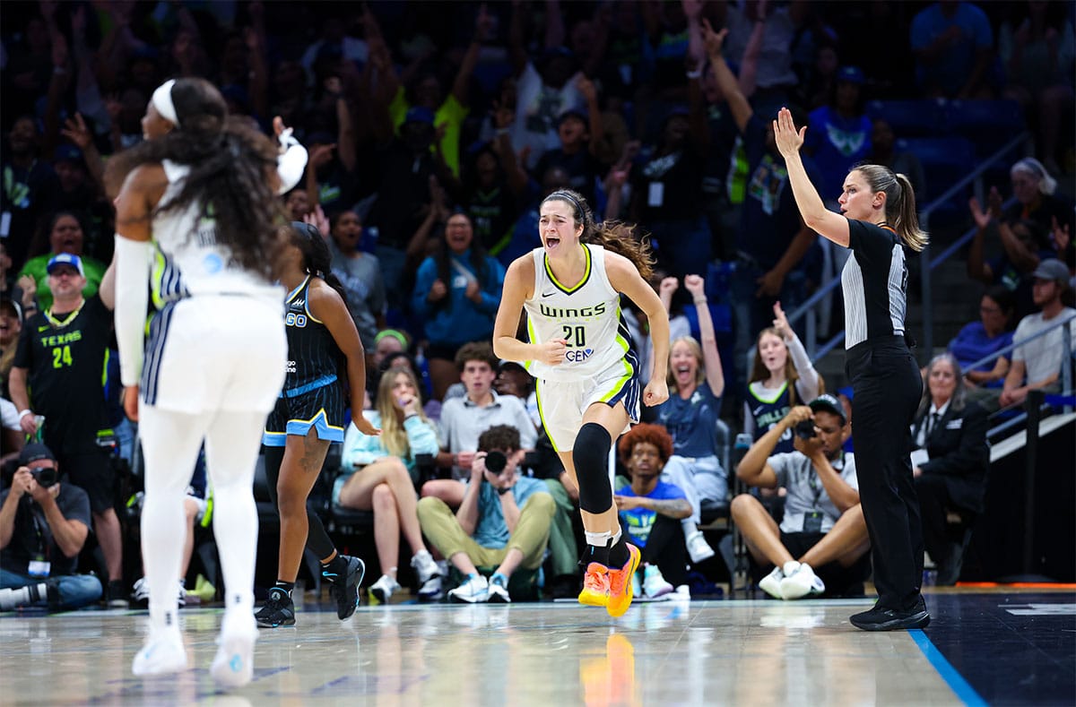 Dallas Wings forward Maddy Siegrist (20) reacts after scoring over Chicago Sky guard Dana Evans (11) during the second half at College Park Center. 