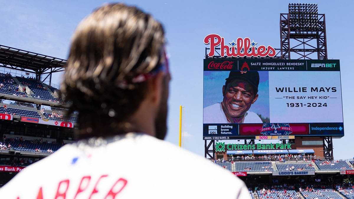 first base Bryce Harper stands for a moment of silence in honor of the late Willie Mays before a game against the San Diego Padres at Citizens Bank Park. 