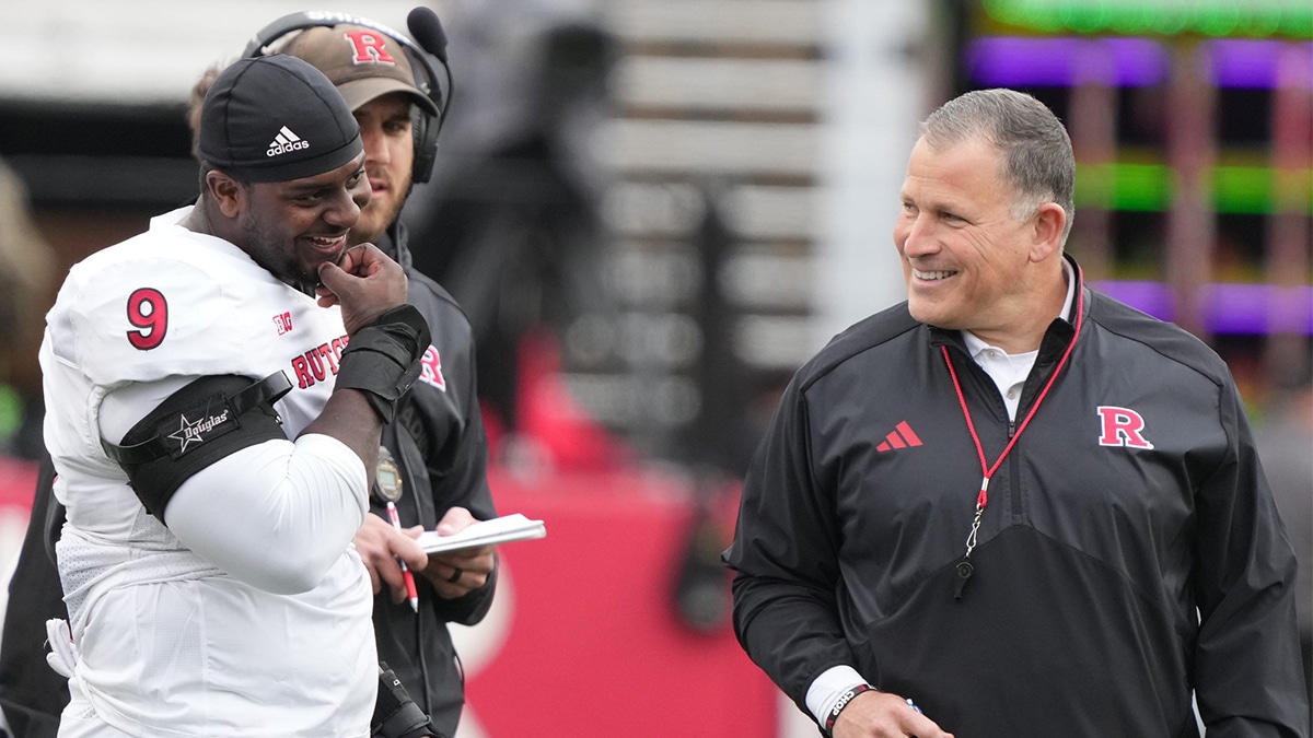 Piscataway, NJ -- April 27, 2024 -- Malcolm Ray with coach Greg Schiano on the sidelines during Rutgers annual spring football game at SHI Stadium.