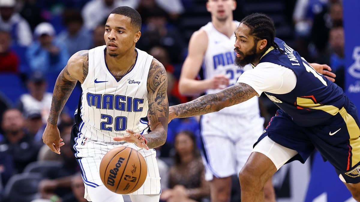 Orlando Magic guard Markelle Fultz (20) dribbles as New Orleans Pelicans forward Brandon Ingram (14) defends during the second quarter at Amway Center. 