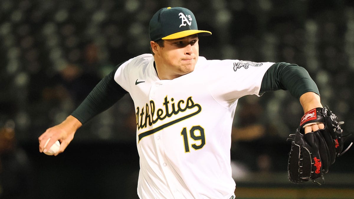 Oakland Athletics relief pitcher Mason Miller (19) pitches the ball against the Kansas City Royals during the ninth inning at Oakland-Alameda County Coliseum