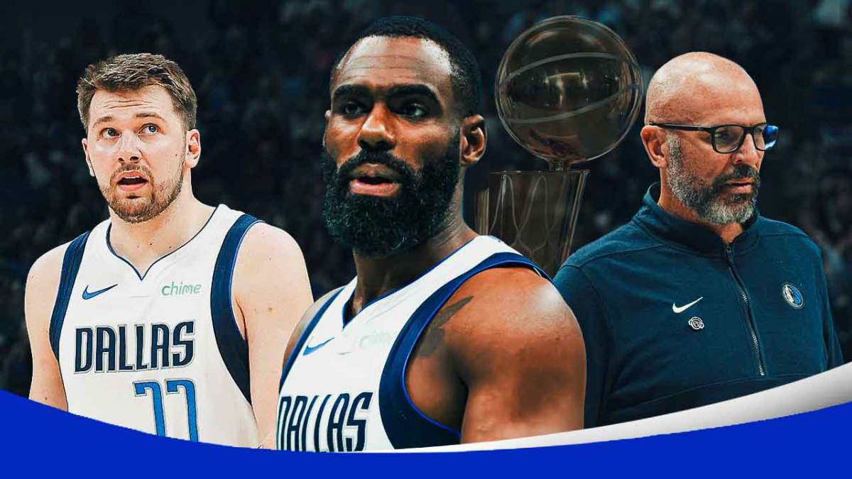 Mavericks' Luka Doncic, Tim Hardaway Jr., and Jason Kidd all sad, with the Larry O'Brien trophy vanishing on the side