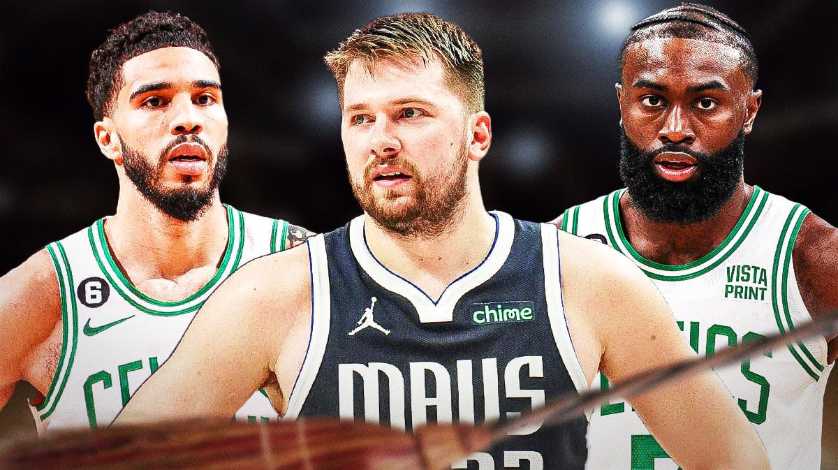 Luka Doncic with Jayson Tatum and Jaylen Brown in background with brooms
