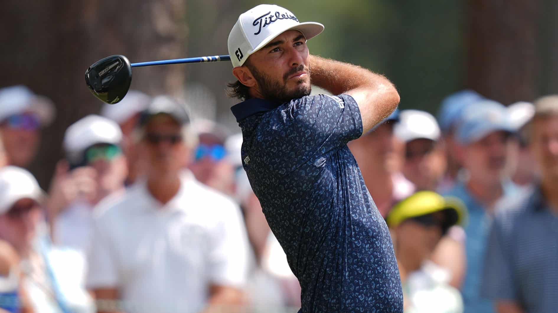 Max Homa plays his shot from the sixteenth tee box during the first round of the U.S. Open golf tournament.