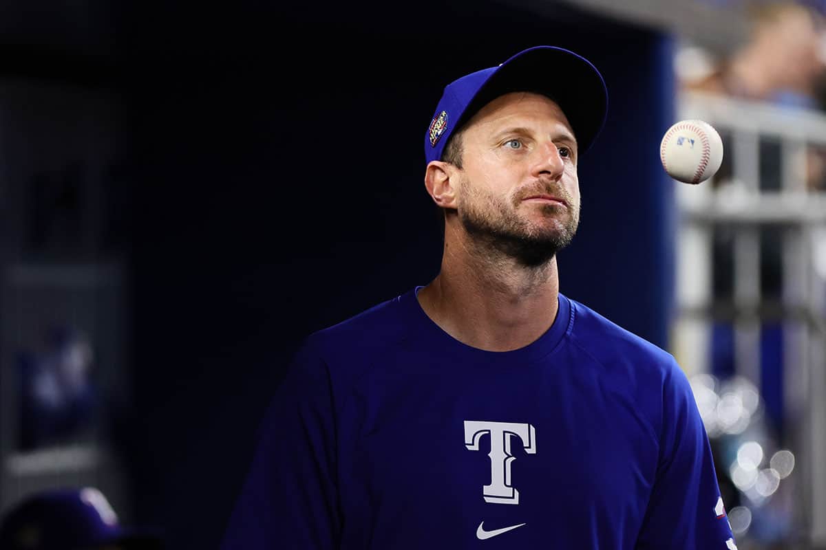 Texas Rangers starting pitcher Max Scherzer (31) looks on from inside the dugout against the Miami Marlins at loanDepot Park.