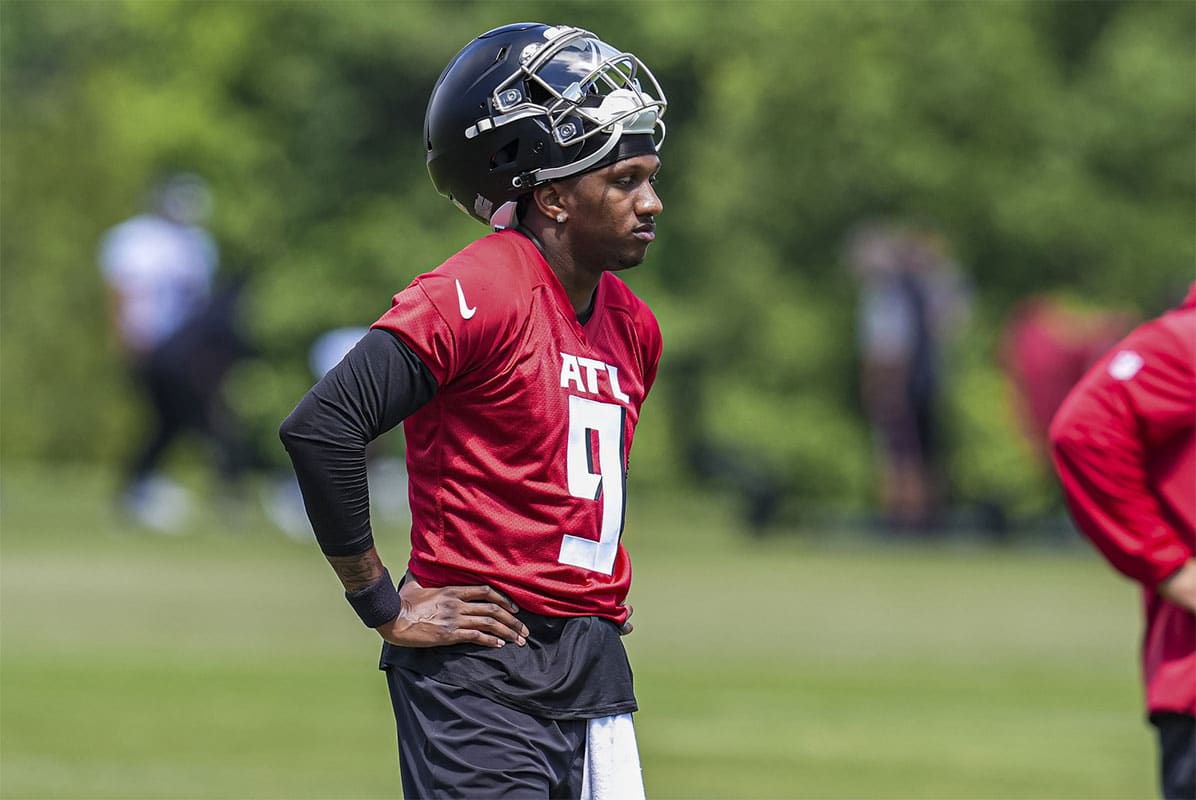 Atlanta Falcons quarterback Michael Penix Jr (9) shown on the field during a break during Rookie Minicamp at the Falcons Training Camp.