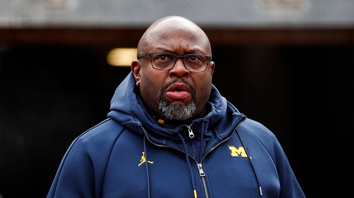 Michigan running back coach Tony Alford walks down the tunnel before the spring game at Michigan Stadium in Ann Arbor