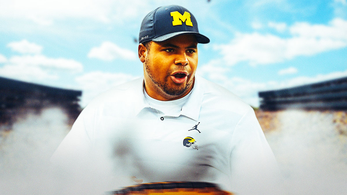 Michigan football, Wolverines, Grant Newsome, Andrew Babalola, Michigan football recruiting, Grant Newsome (as a coach, not a player) with Michigan football stadium in the background