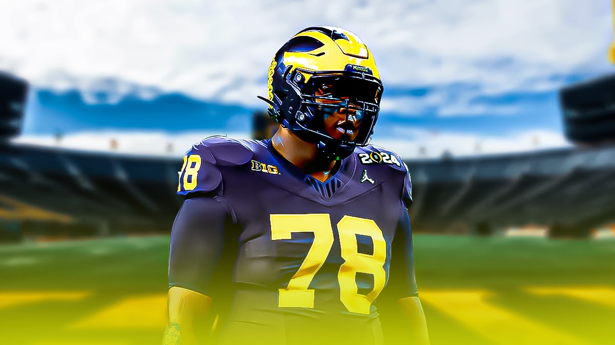 Kenneth Grant, Sherrone Moore, Michigan football, Wolverines, Kenneth Grant Michigan, Kenneth Grant in Michigan uni with Michigan football stadium in the background